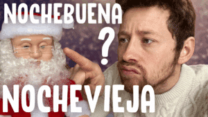 Miniature de vidéo avec une photo de Pierre avec un petit Père Noël et le titre « Nochebuena - Nochevieja » et un point d'interrogation entre les deux mots, illustrant un article Holamigo