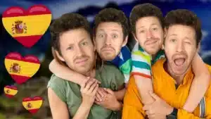Miniature de vidéo avec Pierre et des clones à son image pour représenter sa famille, avec des drapeaux espagnols en forme de cœurs, pour illustrer un article Holamigo